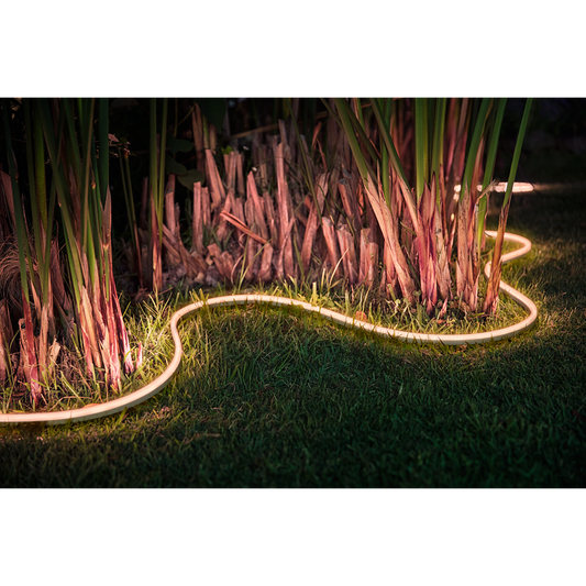 Philips Hue Outdoor Lightstrip outdoor in palms on grass