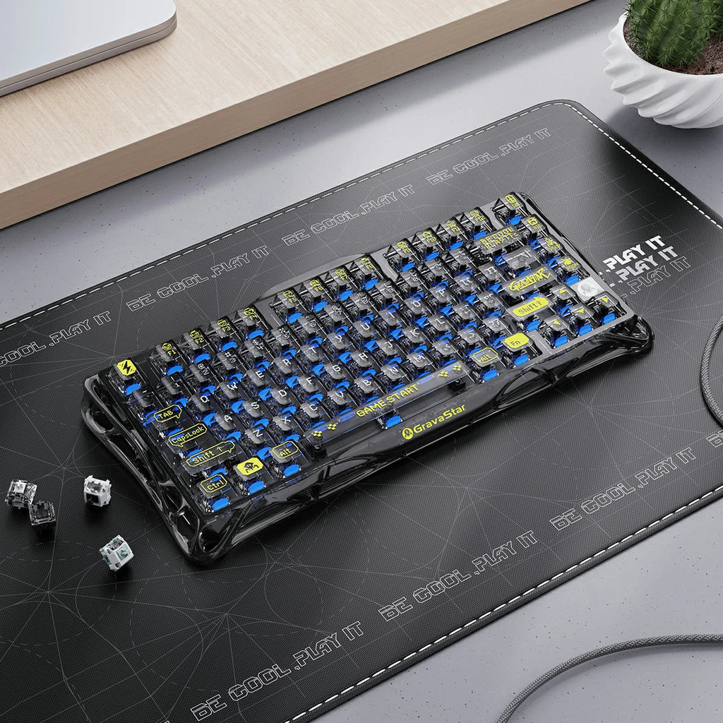 Mechanical keyboard on a desk with a mouse pad