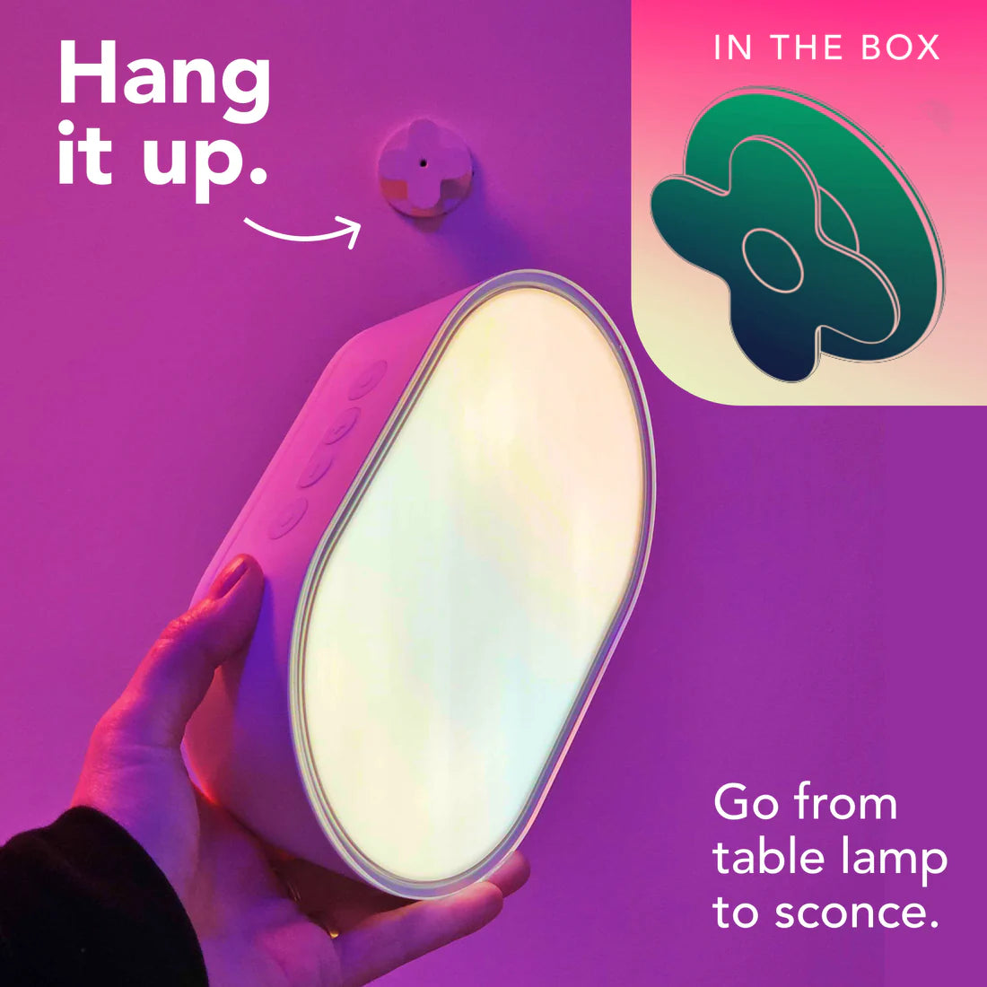 Light fixture being held with text indicating it can be hung and transformed into a sconce.