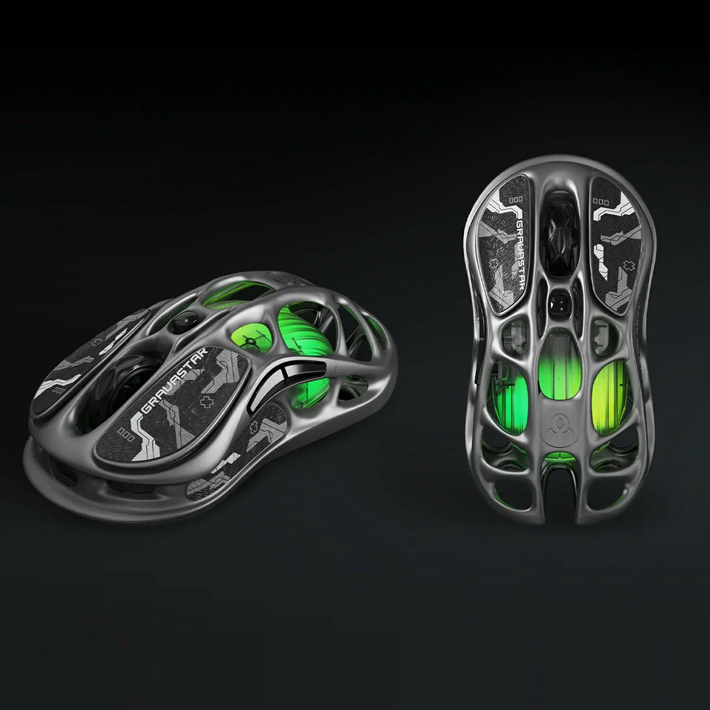 Two black and green high-tech devices on a dark background