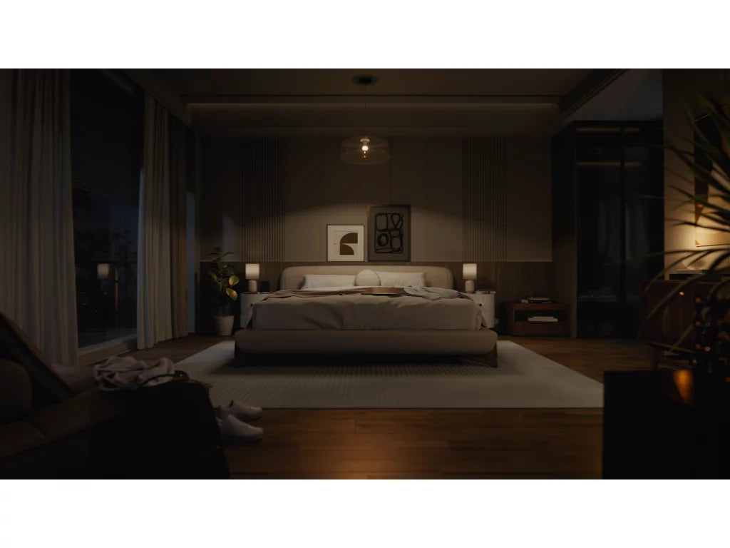 Dark bedroom with a bed and minimal lighting