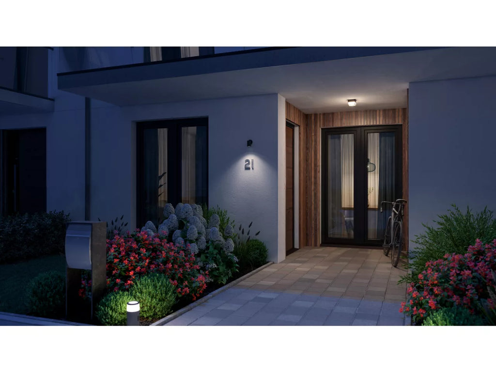 front door of a house illuminated by philips hue