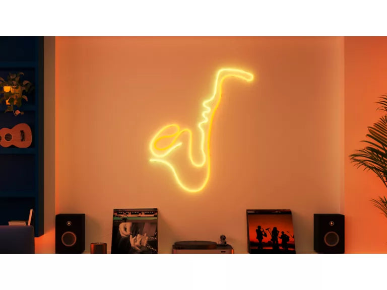 Wiz Smart Flex Neon saxophone light on a wall with music-themed decor below