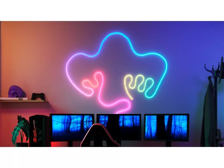 Neon light shaped like a cloud with colorful outlines in a room with screens and decor using Wiz Smart Flex 