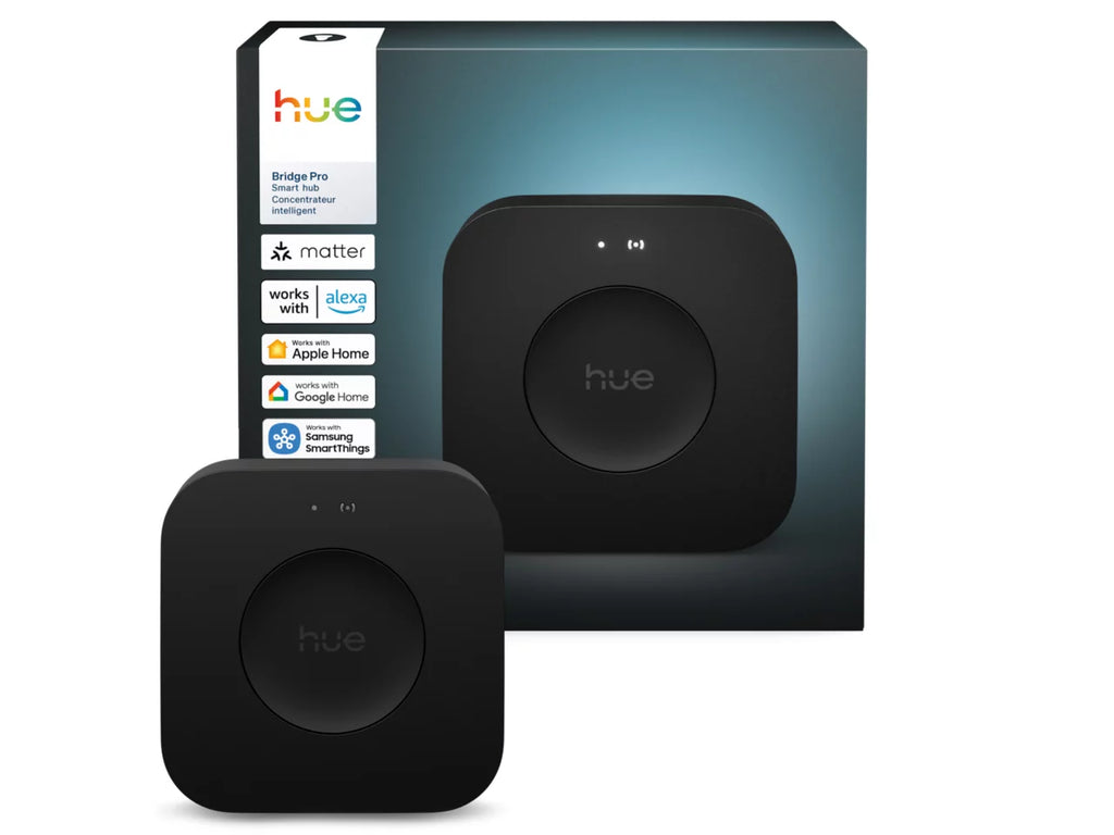Black Hue bridge pro device with packaging on a white background