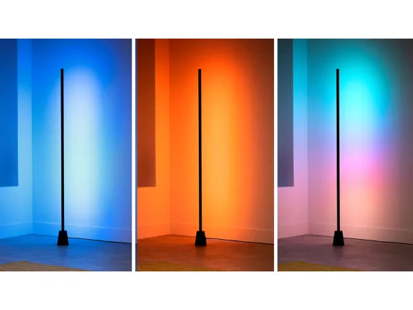 Three views of a tall, thin floor lamp with colorful light projection on walls.