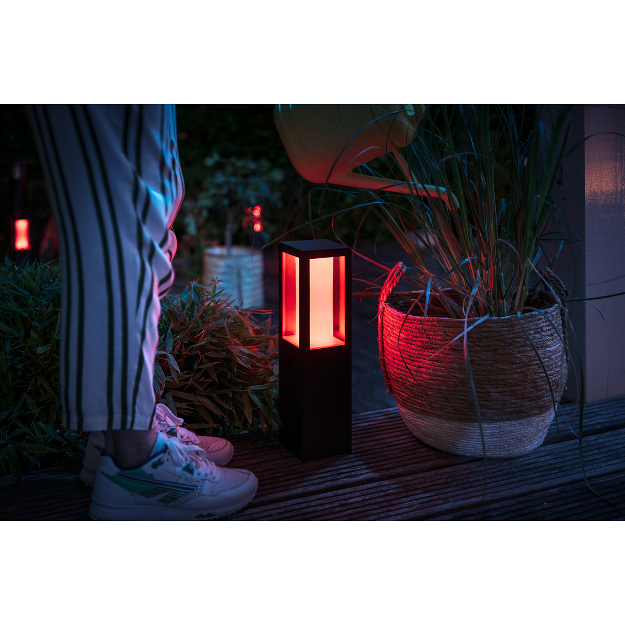 Philips Hue Impress Pedestal Light in garden  RED